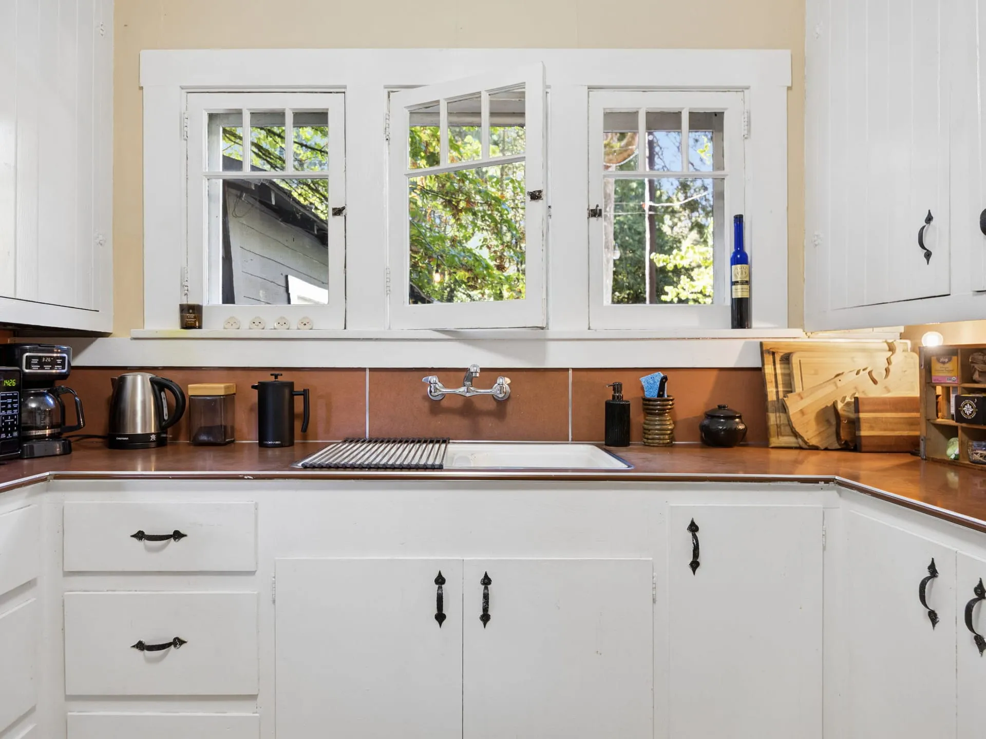 Vintage kitchen with white cabinets