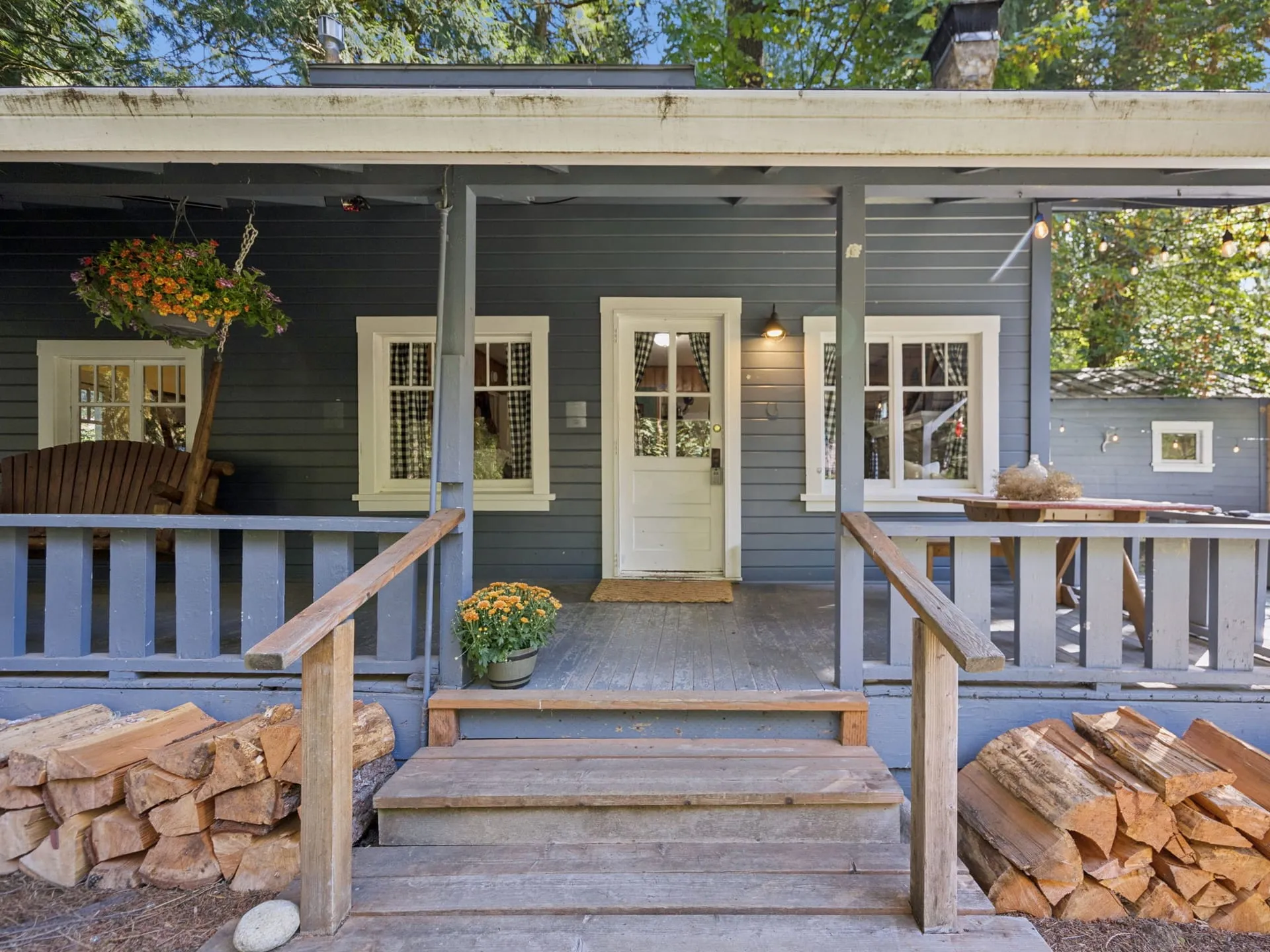 Front porch entry with stacked firewood