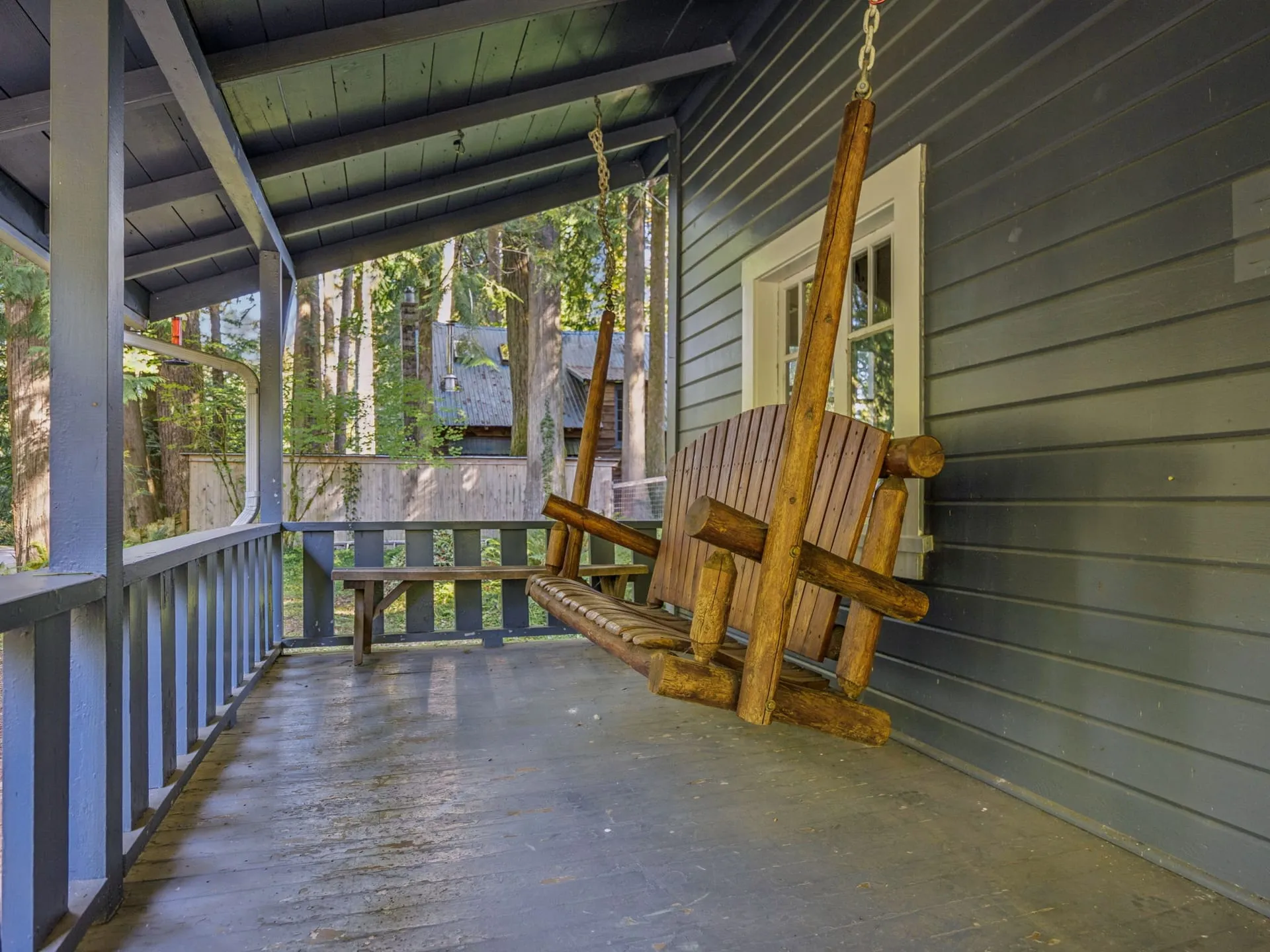 Porch swing on the 27-foot-wide front porch