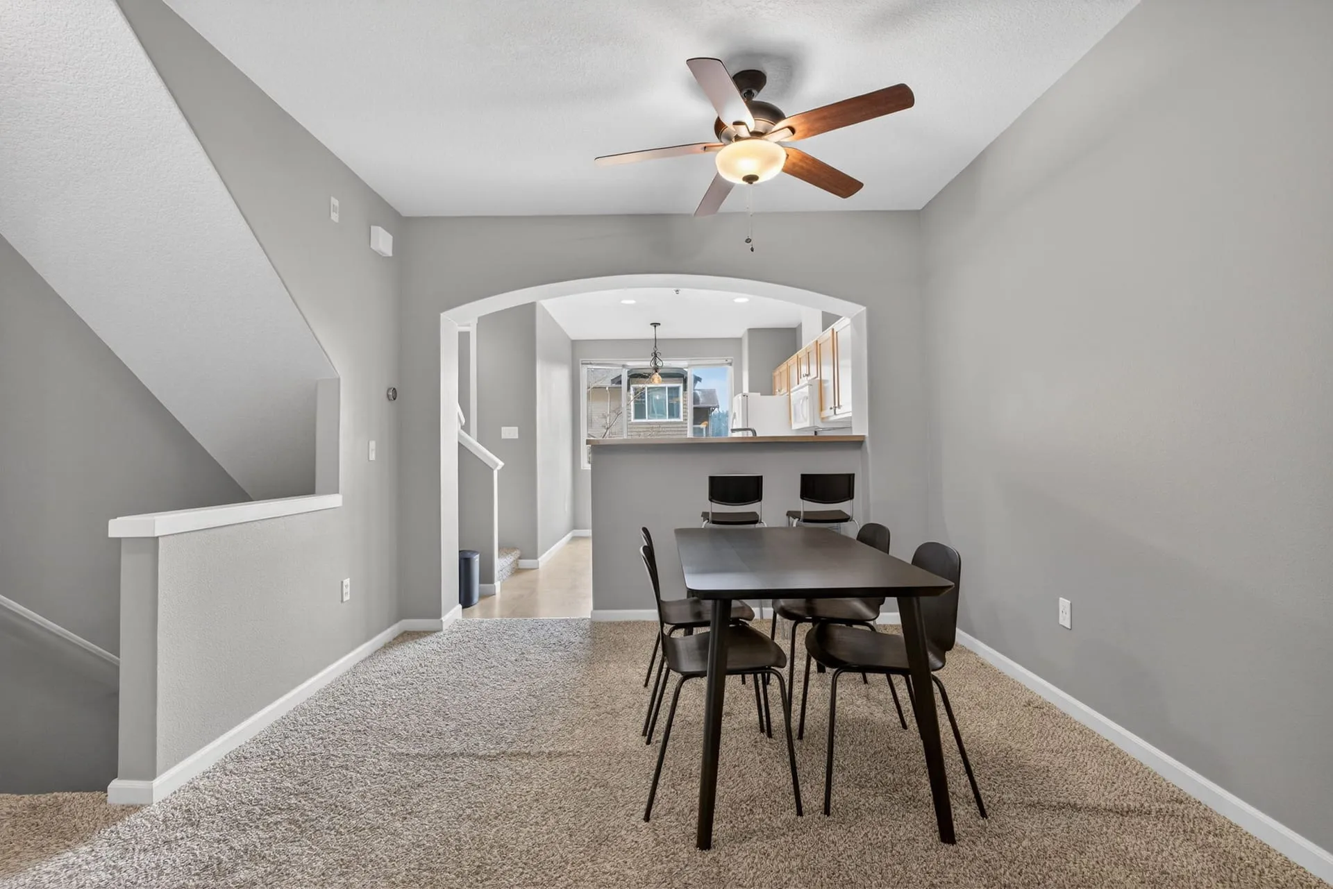 Dining area with ceiling fan