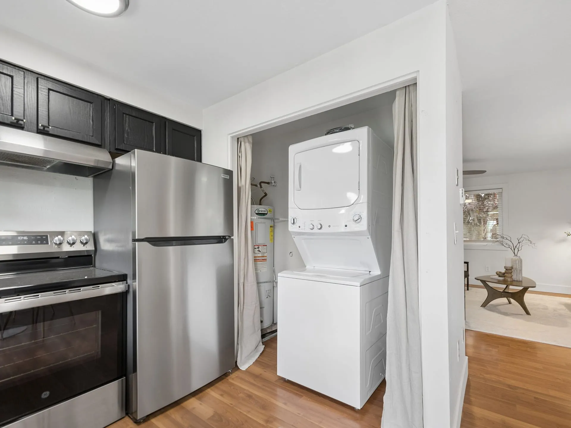 Unit 7322 kitchen with stacked washer and dryer