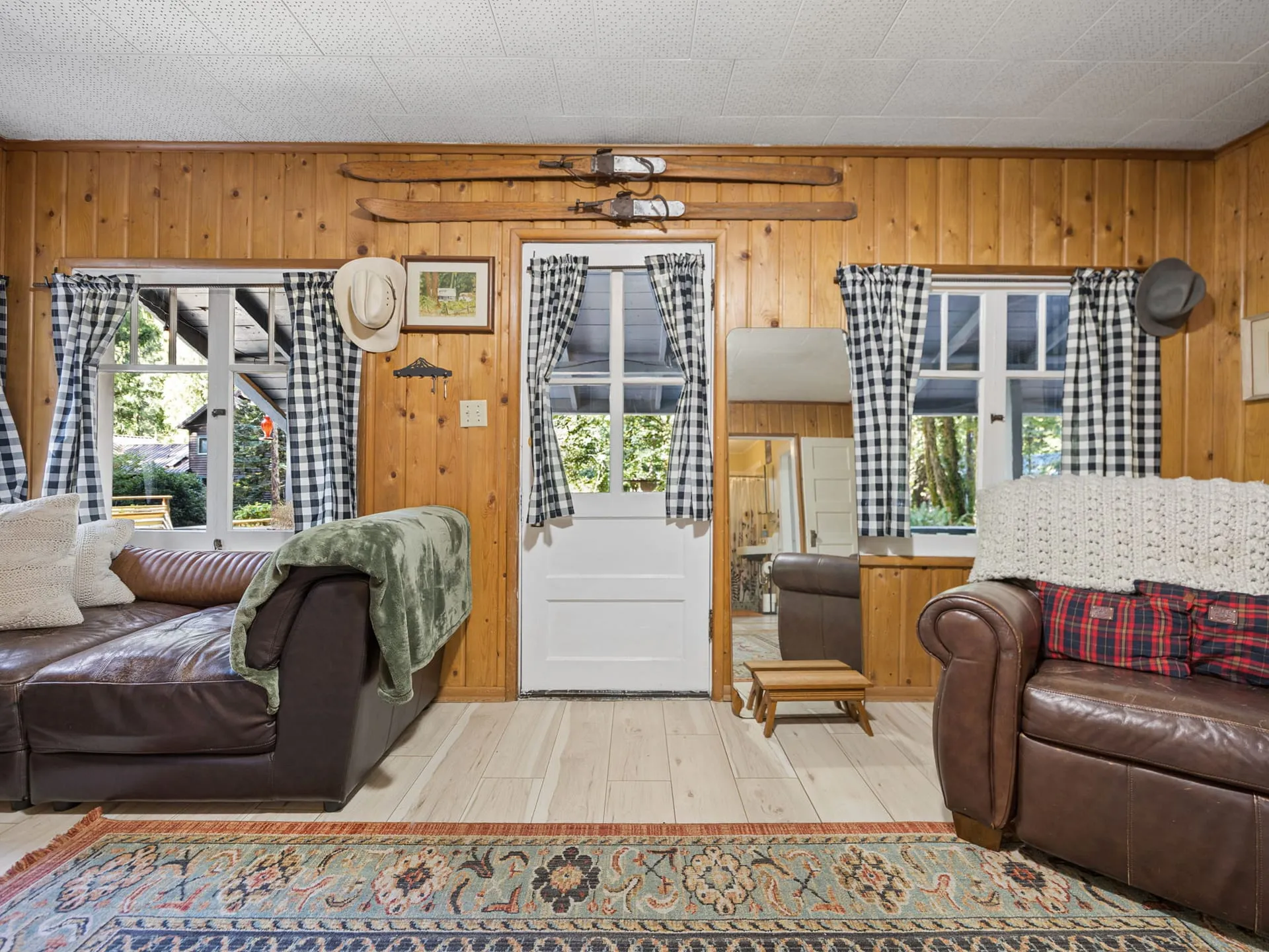 Living room with knotty pine walls