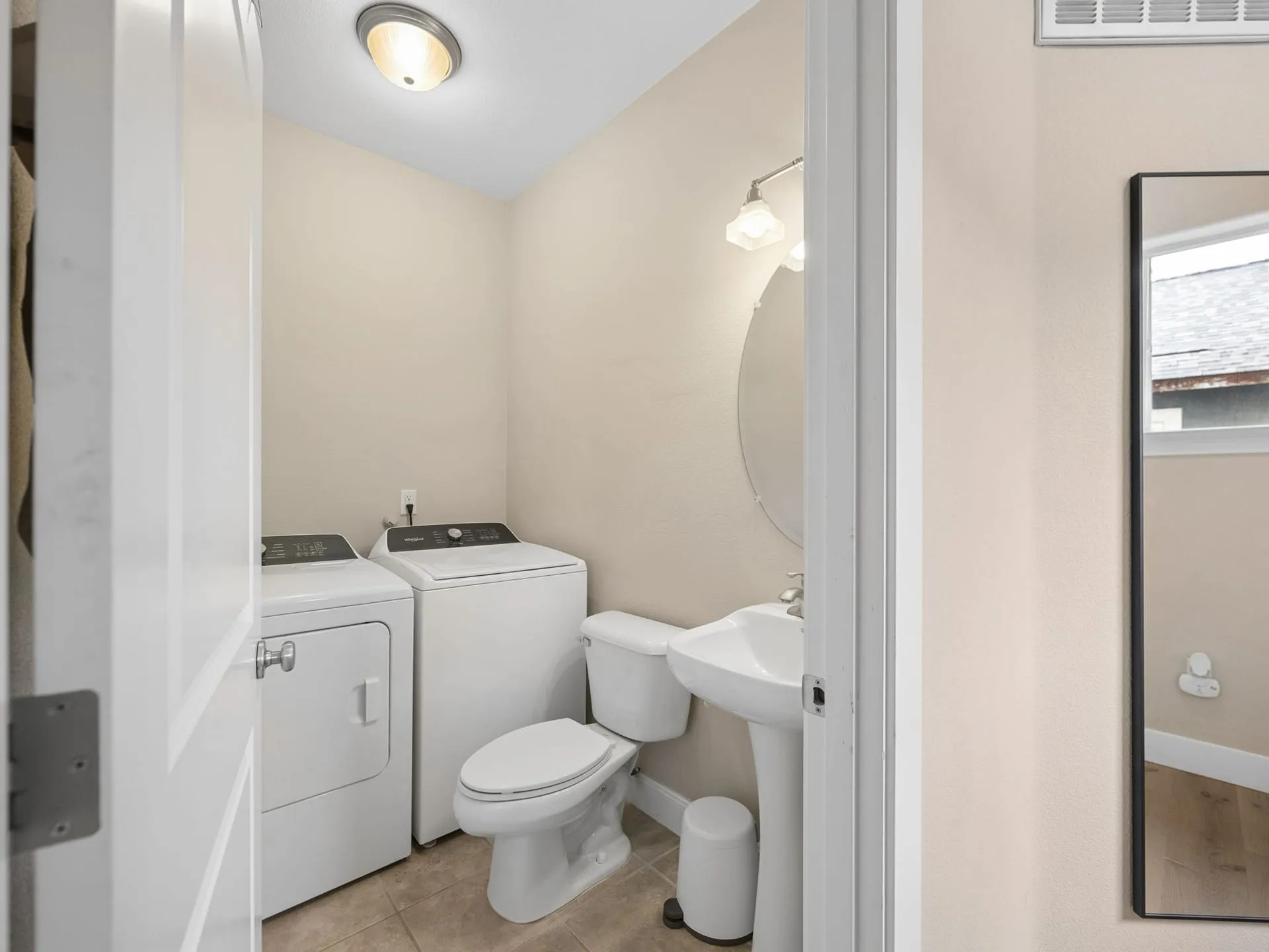Main-level half bath with laundry